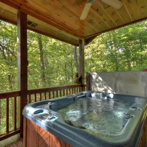 Bearfoot Ridge Wood-burning fireplace cozy hot tub serene views
