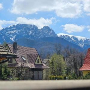 Giewont View Apartamenty z widokiem - Butikowe & Sauna Jacuzzi Basen - Grunwaldzka Krupówki Centrum Zakopane by RentiloPL