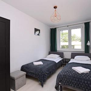 Victus Cozy Apartment with Remote Work by Noclegi Renters