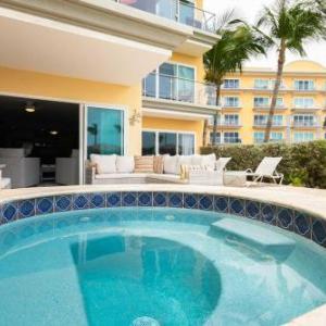 Beachfront - Garden Delight 2BR condo - E125-2