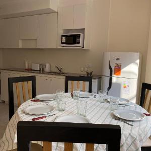 Excepcional apartamento con patio cochera y parrilla en el centro