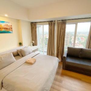 Cozy Studio at Altiz Bintaro Apartments by OkeStay