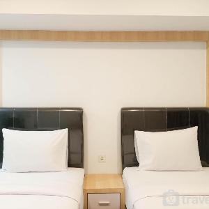Homey Studio at De Prima Apartment By Travelio