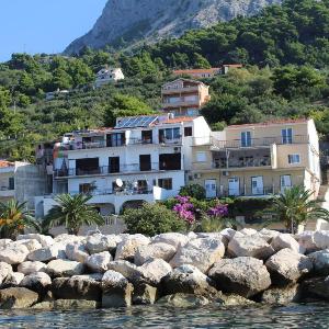 Apartments by the sea Podgora Makarska - 21378