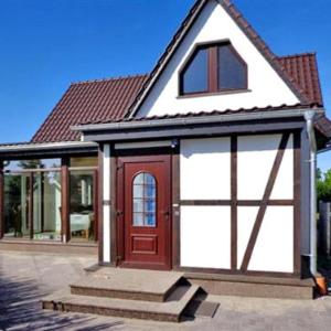 Ferienhaus mit Kamin und Wintergarten