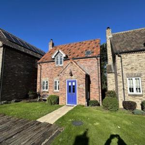 Wren Cottage - Part of the The Bay Filey Holiday Village with pool gym and direct beach access pub restaurant tennis and meadows walks