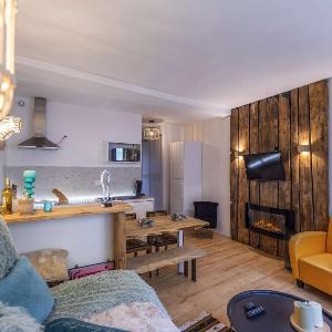 T2 rénové et cosy face aux thermes avec cour privative et équipements modernes