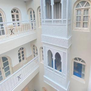 Riad K-White
