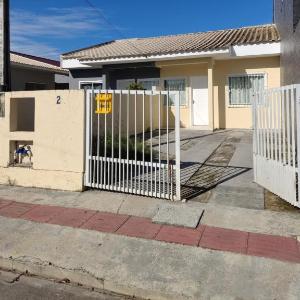 EM CASA