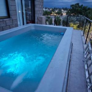 Vivisierras Piso 4 frente al lago Centro Villa Carlos Paz minipileta climatizada vista panorámica