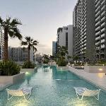 Canal-View Serenity: Modern Studio in Sterling Dubai 