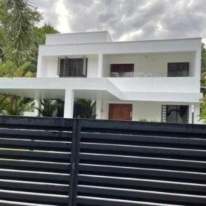Posh Villa 3 bed 3 bath ac  2 kitchen  Dining living room  family room  in TVM  Kowdiar please contact host refeekhm at yah dot com or refeekhm at gmai el dot com please don't pay without contacting host