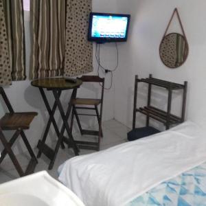 Suite dos Anjos com Cozinha 100m da Praia dos Anjos