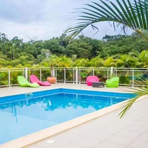 Maison charmante Le Moule avec piscine partagée
