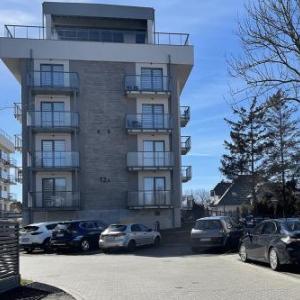 Jasny Apartament Sun Seasons 24 z Umeblowanym Balkonem i Parkingiem by Noclegi Renters