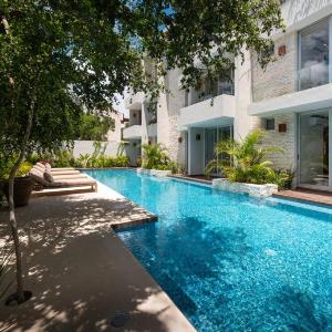NHOA 211C Lux 1BR Condo Pool View in Aldea Zama