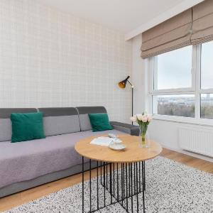 9th Floor Green and Grey Apartment in Gdańsk Brzeźno with Two Bedrooms and Parking by Noclegi Renters