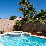 Spacious sparkling luxury home with private HEATED saltwater pool and hot tub EV power station