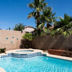 Spacious sparkling luxury home with private HEATED saltwater pool and hot tub EV power station