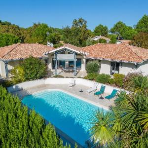 Villa familiale avec piscine chauffée clim 4 chambres proche golf et plages - FR-1-319-565