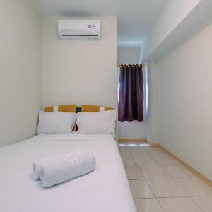 Homey 2BR Apartment at Springlake Summarecon Bekasi By Travelio