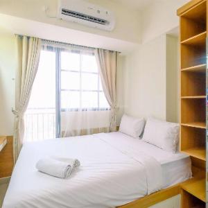 Good Choice and Strategic 2BR without Living Room Evenciio Apartment By Travelio