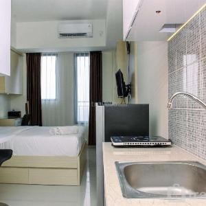 Elegant and Nice Studio at Evenciio Margonda Apartment By Travelio