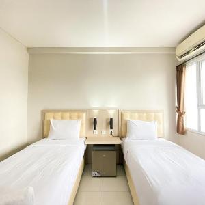 Comfort and Homey Studio Room (No Kitchen) Elvis Tower Apartment By Travelio
