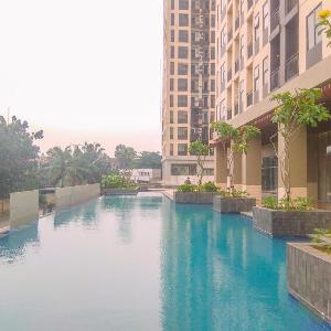 Cozy Living and Homey Studio Transpark Cibubur Apartment By Travelio