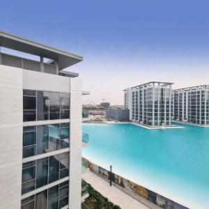 Modern waterfront 1 BR at District One