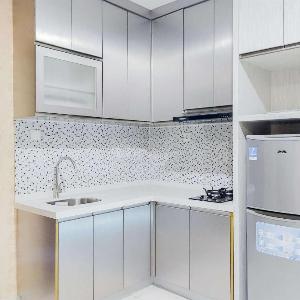 Compact and Homey Studio at Brooklyn Alam Sutera Apartment By Travelio