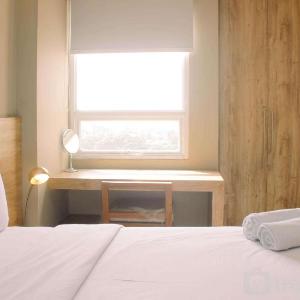 Stunning and Comfortable 1BR Apartment Mustika Golf Residence By Travelio