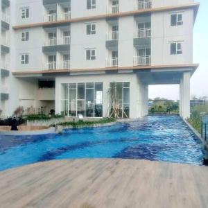 Well Furnished and Homey Studio (No Kitchen) Apartment at Suncity Residence By Travelio