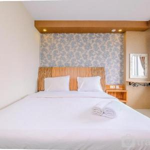 Homey Simply Look 2BR Bogor Icon Apt By Travelio