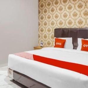 SUPER OYO Capital O 92066 Papakoel Hotel & Cafe