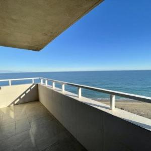 Exclusive beachfront apartment Torremolinos - pool - paddle - tenis - wifi - central aircon