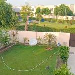 Haven Lodge Lahore by Haven Holiday Homes - 4BR Vacation Home with Lawn & Park Access Lahore 