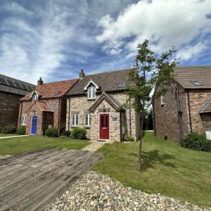 Seashells Cottage - Part of the The Bay Filey Holiday Village with pool gym and direct beach access pub restaurant tennis and meadows walks