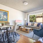 Unit With Balcony Backyard and Parking Near Shops