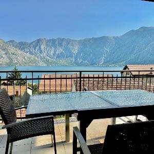 Prcanj sunny port apartments with shared pool