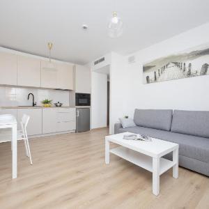Pileckiego Apartments with Parking & Balcony by Noclegi Renters