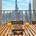 Skyline Serenity Holiday Home I Chic 4 Bedroom Apartment I Burj Khalifa & Fountain Views I Direct Access to Dubai Mall I Free Gym Pool Parking and Wi-Fi 