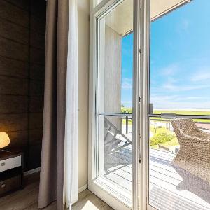 Kleine Welle - Haustierfreundliches Zwei-Zimmer Apartment mit Südbalkon und Platz für drei Personen im ersten Obergeschoss