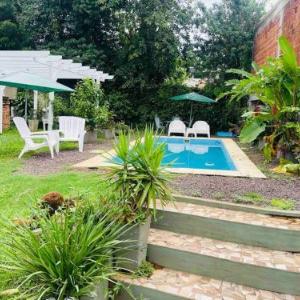 Apart El Altillo loft ambientes abiertos 5 pax en Cataratas pileta compartida