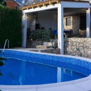 Family friendly house with a swimming pool Makarska - 23571