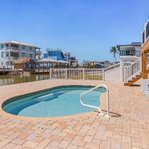 920 Bay Breeze Bungalow- Stunning Bay View Home with Heated Pool! home