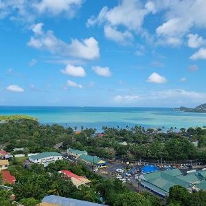 Serene Sunset Escape - Panoramic Ocean View Apartment