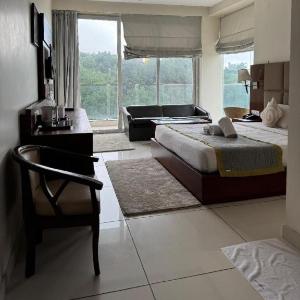 Goroomgo Manuni Inn Dharamshala