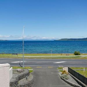 Lakefront Living 3-Level Home With Spectacular Water and Mountain Views