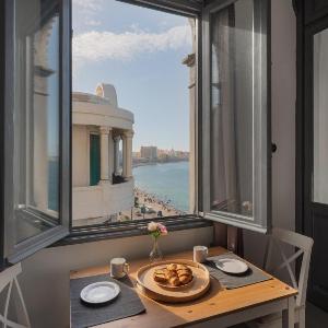 grey l studio apartments Corniche Alexandria Little Venice